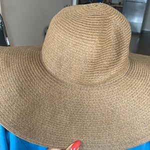 2 floppy beach hats-  1black 1brown